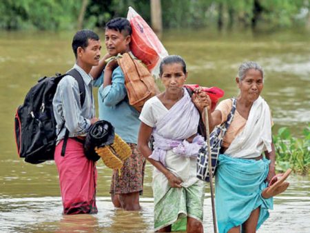 NRC और बाढ़ के साथ असम में दोहरा संकट